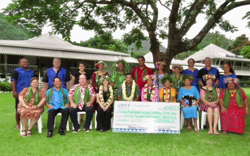 Members of Tauturu Aotearoa with the cheque for New Zealand. Photo: Supplied